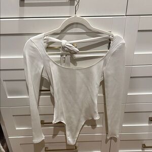 Elegant White Ribbed Bodysuit